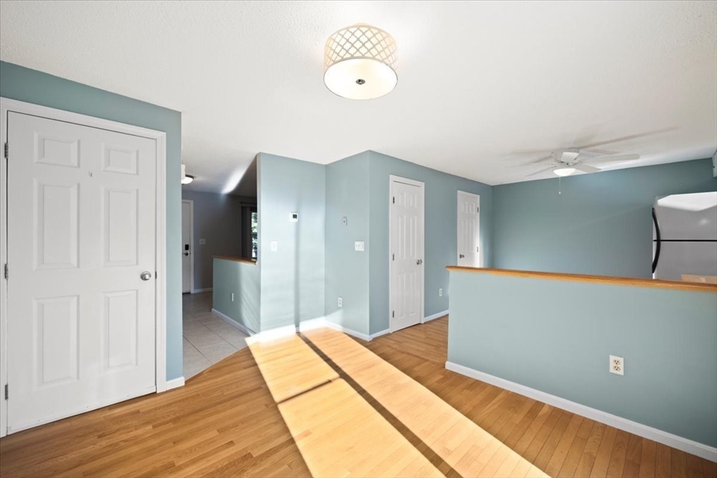 6 Robin Circle, Unit 1 Norton, MA 02766 - Photo 8 of 38 a view of a room with wooden floor