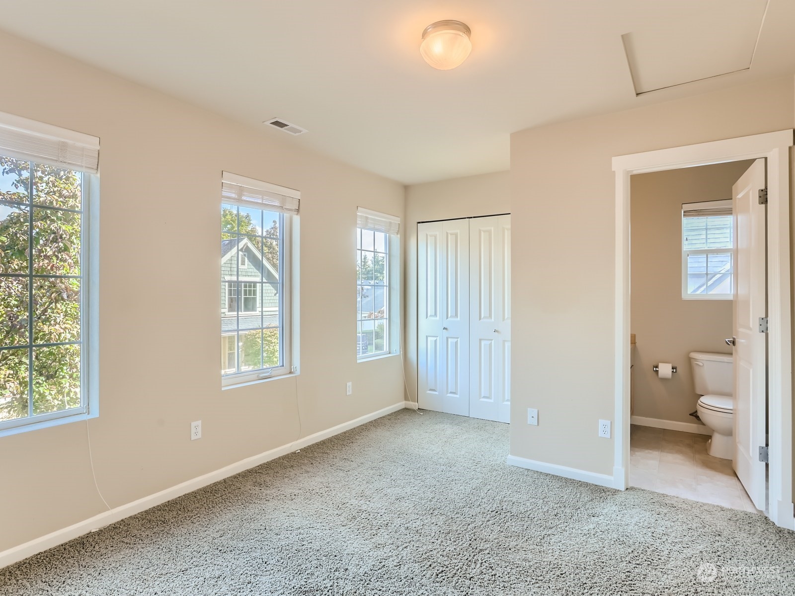 23922 33rd Drive Southeast, Unit 8 Bothell, WA 98021 - Photo 20 of 28 a view of livingroom with a flat screen tv and a window