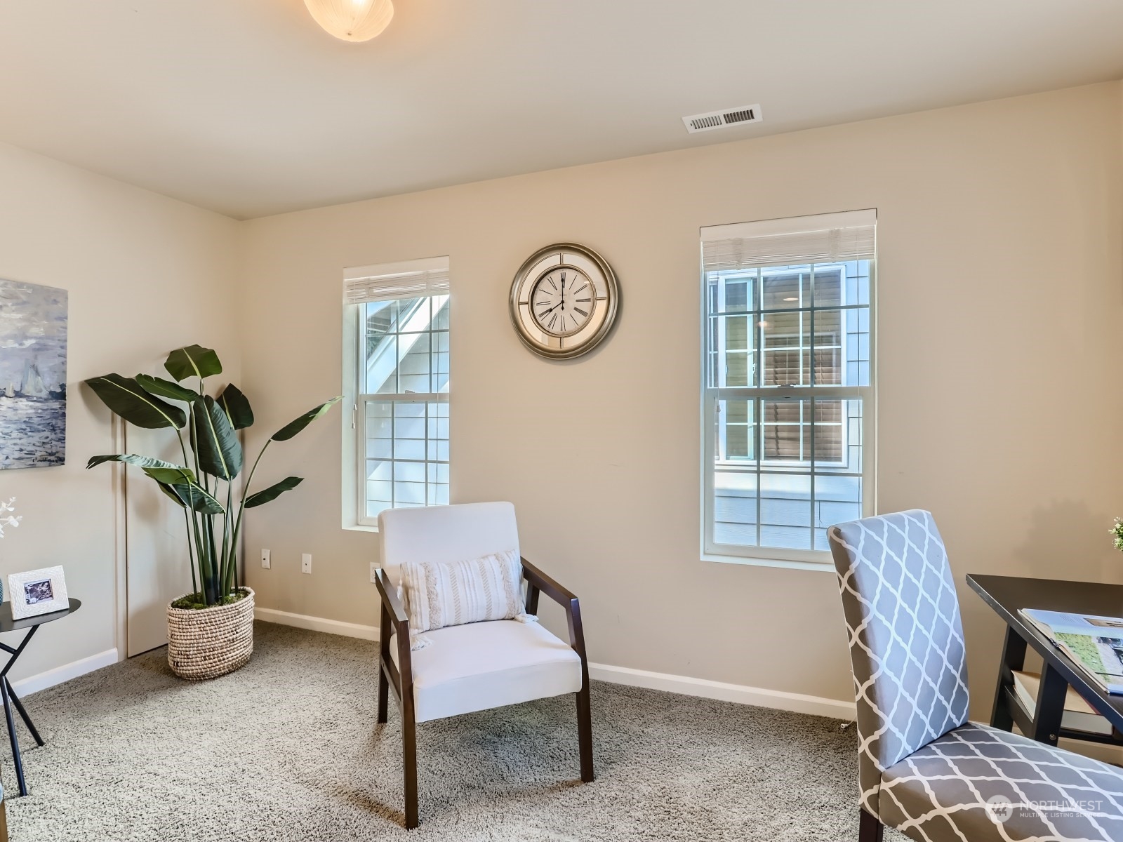 23922 33rd Drive Southeast, Unit 8 Bothell, WA 98021 - Photo 24 of 28 a view of a workspace with furniture and a window