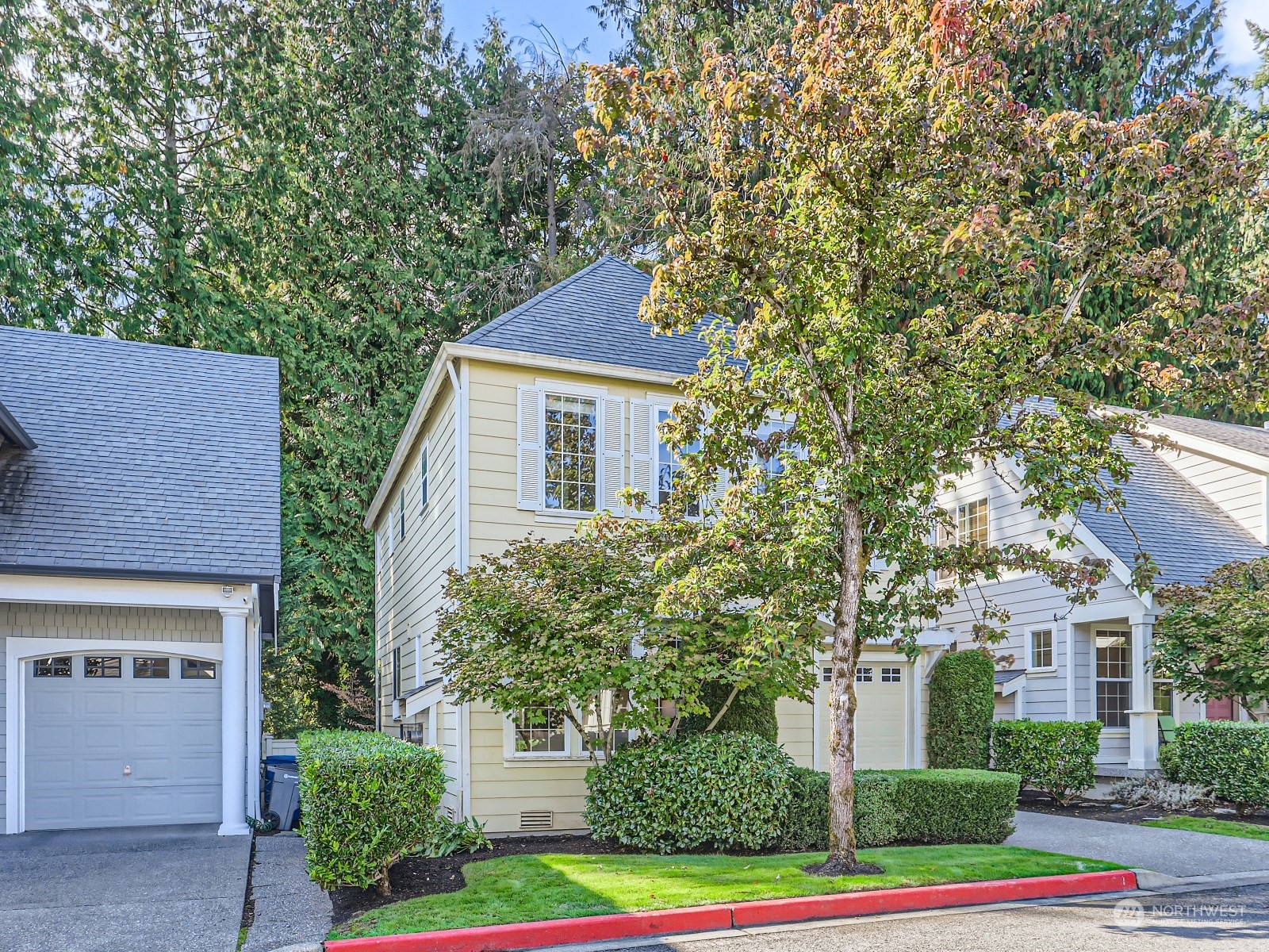 23922 33rd Drive Southeast, Unit 8 Bothell, WA 98021 - Photo 3 of 28 front view of a house with a yard