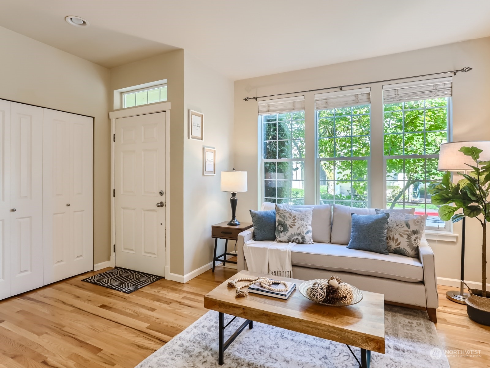 23922 33rd Drive Southeast, Unit 8 Bothell, WA 98021 - Photo 4 of 28 a living room with furniture and a window