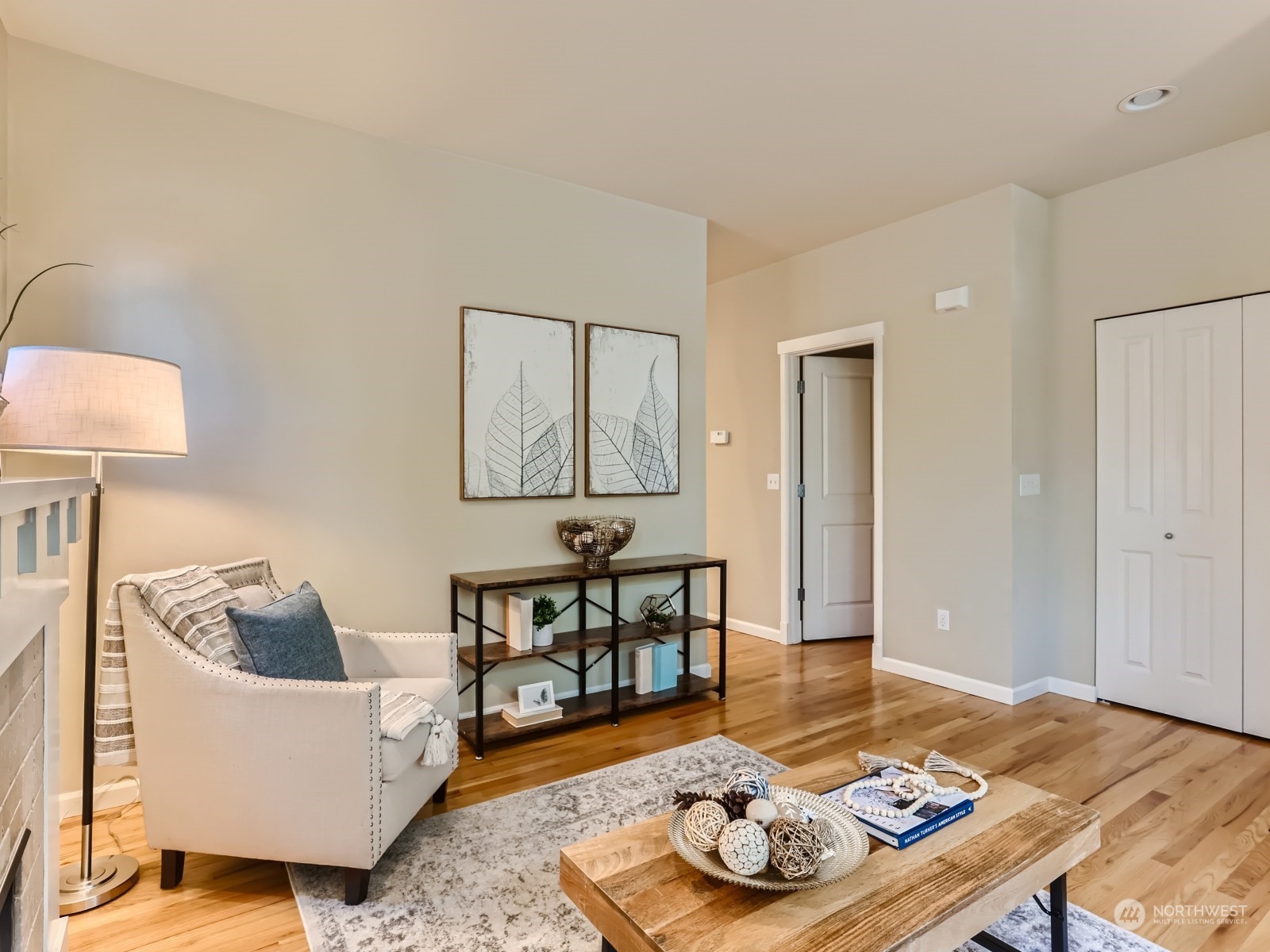 23922 33rd Drive Southeast, Unit 8 Bothell, WA 98021 - Photo 8 of 28 a living room with furniture and wooden floor