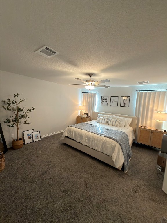 132 Small Seed Buda, TX 78610 - Photo 13 of 18 a bed sitting in a bedroom next to a window