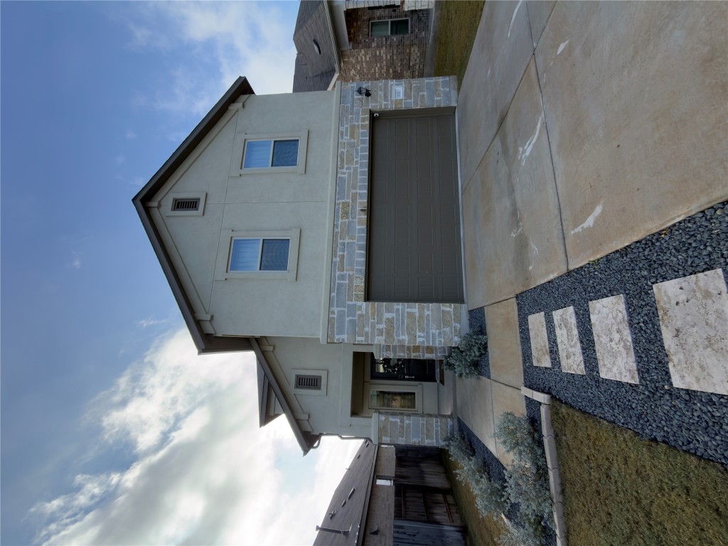 132 Small Seed Buda, TX 78610 - Photo 2 of 18 a front view of a house with yard
