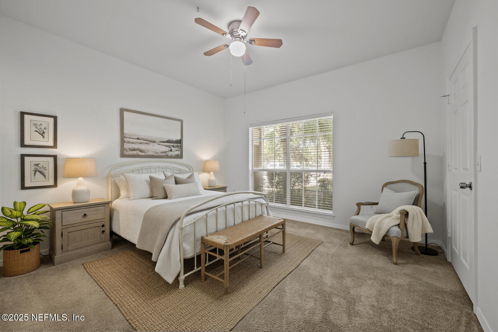 10961 Burnt Mill Road, Unit 1217 Jacksonville, FL 32256 - Photo 17 of 59 a bed room with a bed and a chair