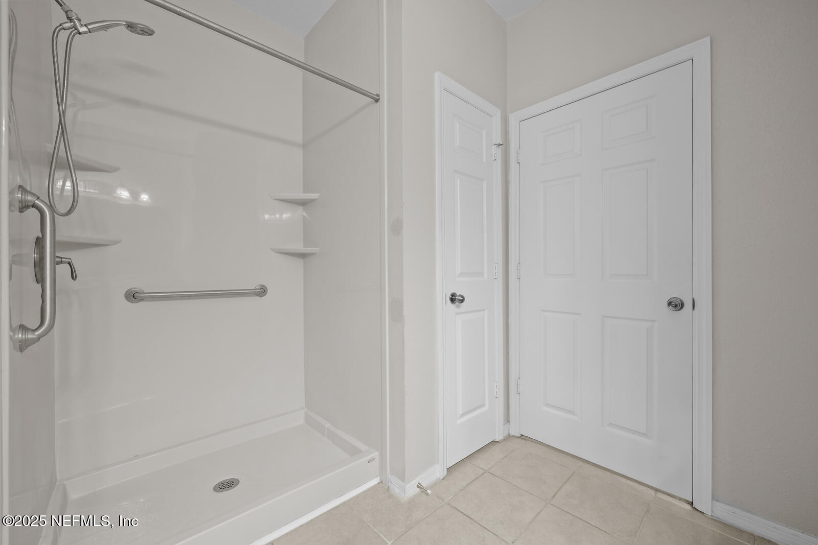 10961 Burnt Mill Road, Unit 1217 Jacksonville, FL 32256 - Photo 20 of 59 a bathroom with a shower