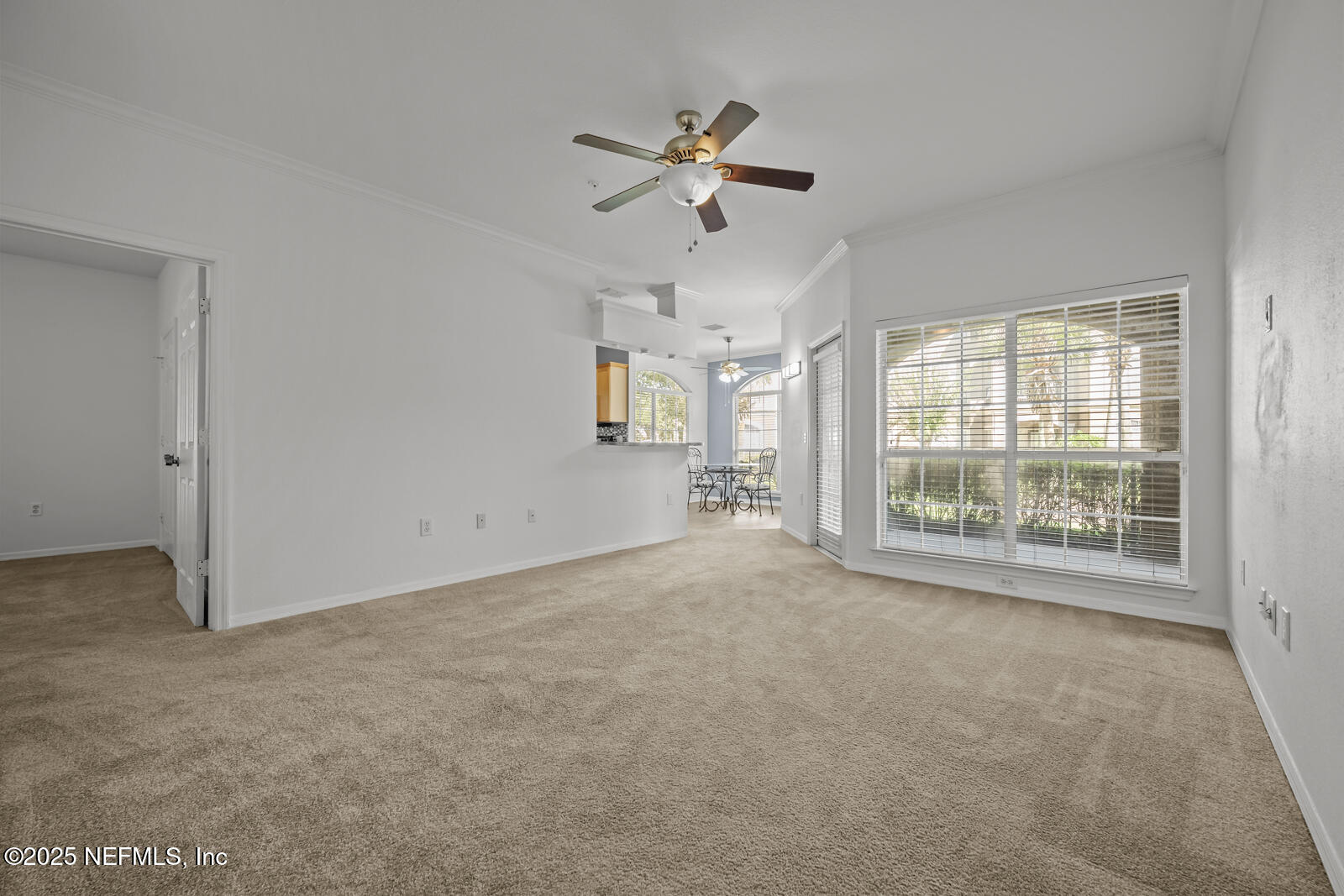 10961 Burnt Mill Road, Unit 1217 Jacksonville, FL 32256 - Photo 2 of 59 a view of an empty room with a window