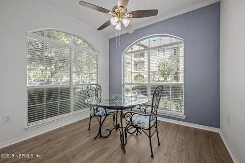 a bed room with a bed and a chair