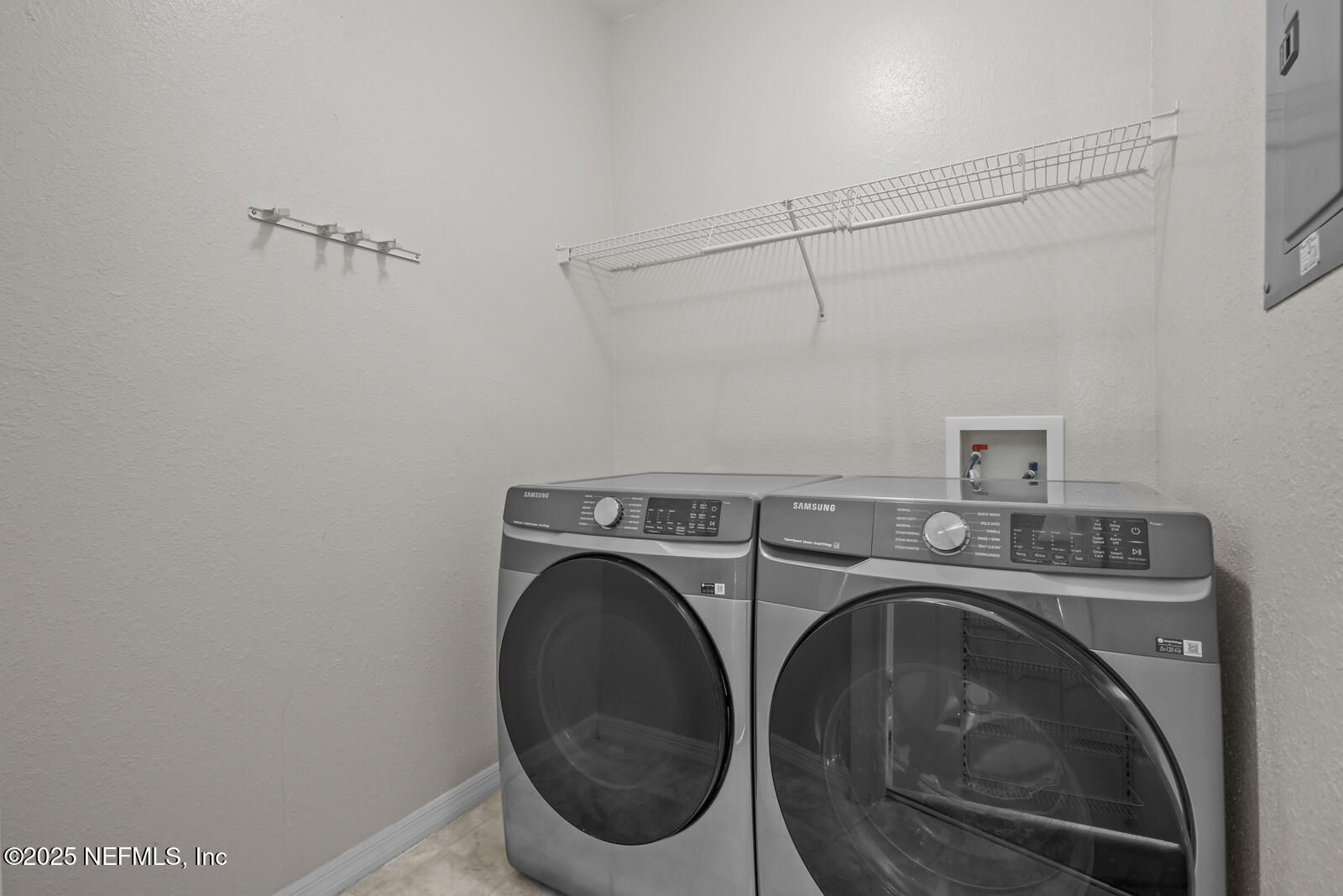 10961 Burnt Mill Road, Unit 1217 Jacksonville, FL 32256 - Photo 22 of 59 a utility room with dryer and washer