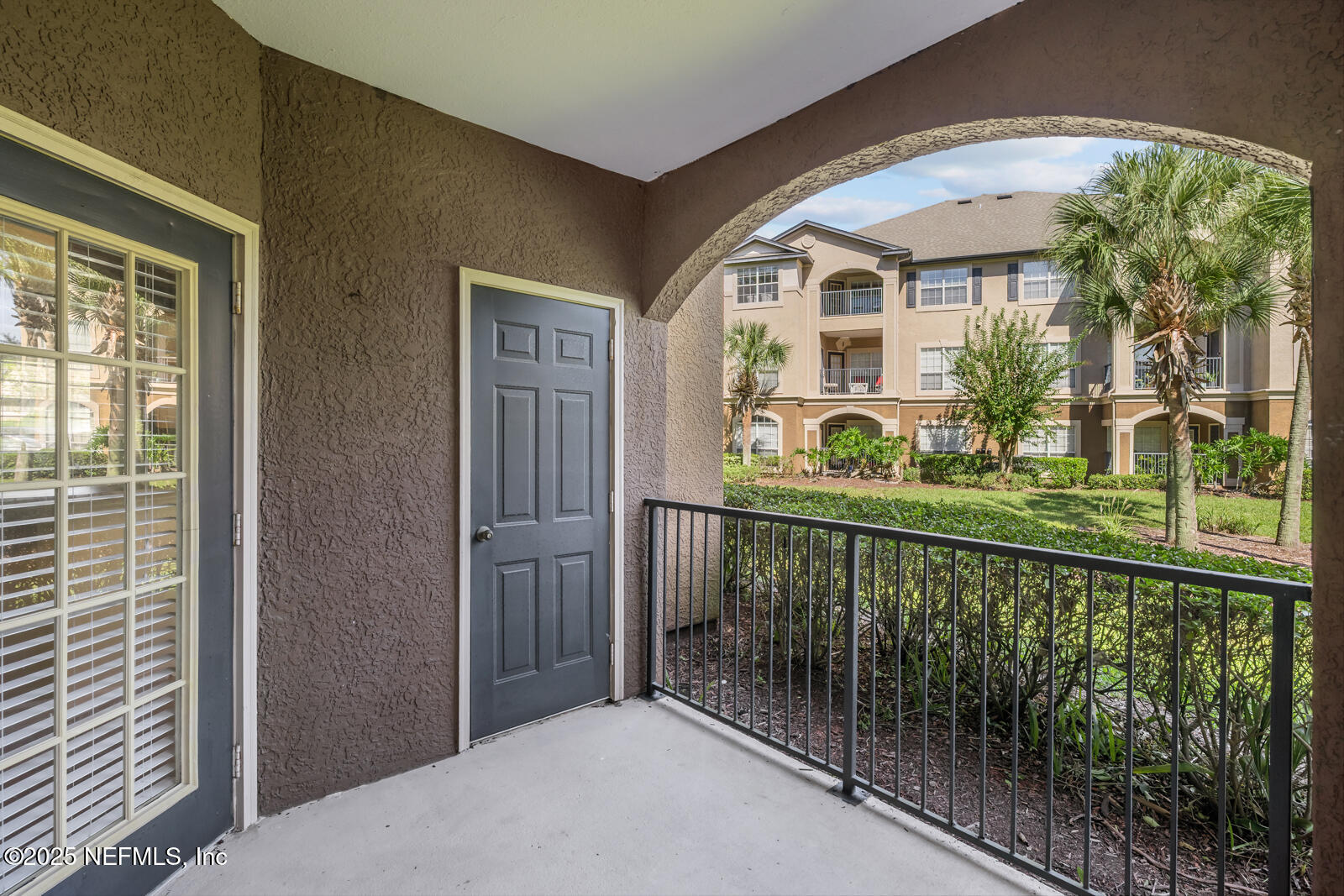10961 Burnt Mill Road, Unit 1217 Jacksonville, FL 32256 - Photo 24 of 59 a view of balcony with garden