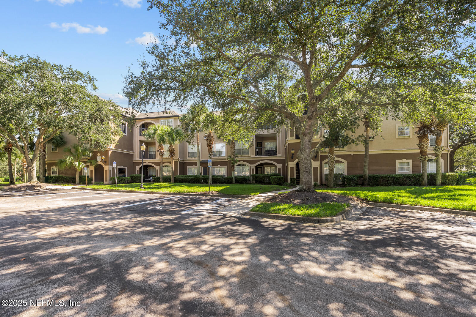10961 Burnt Mill Road, Unit 1217 Jacksonville, FL 32256 - Photo 29 of 59 a view of road with house in background