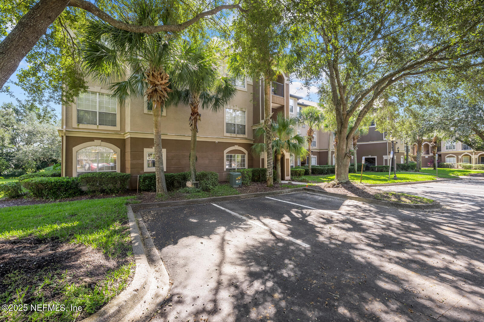 10961 Burnt Mill Road, Unit 1217 Jacksonville, FL 32256 - Photo 53 of 59 a view of a house with a yard