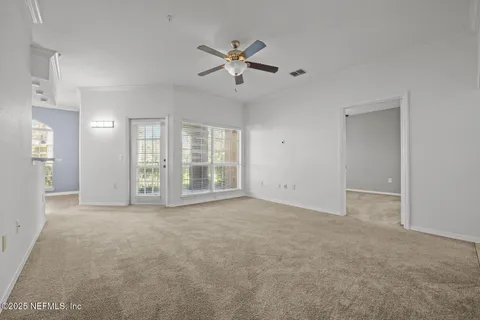 a kitchen with a refrigerator sink and stove