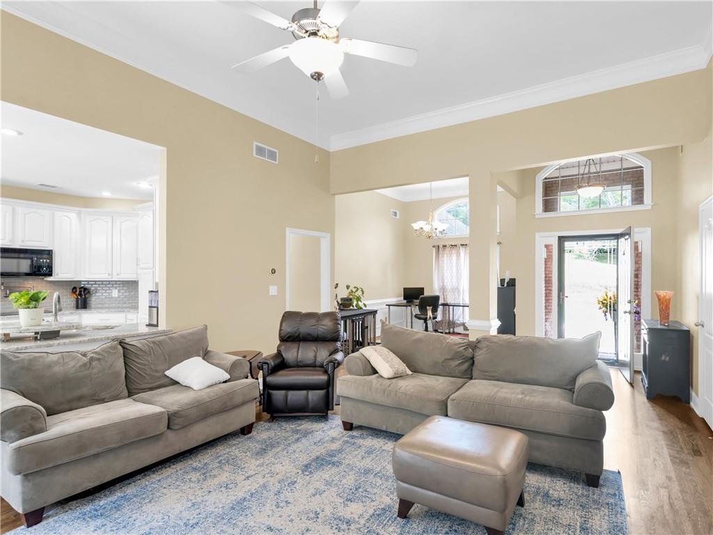 157 Cooks Way McDonough, GA 30252 - Photo 12 of 63 a living room with furniture and a large window