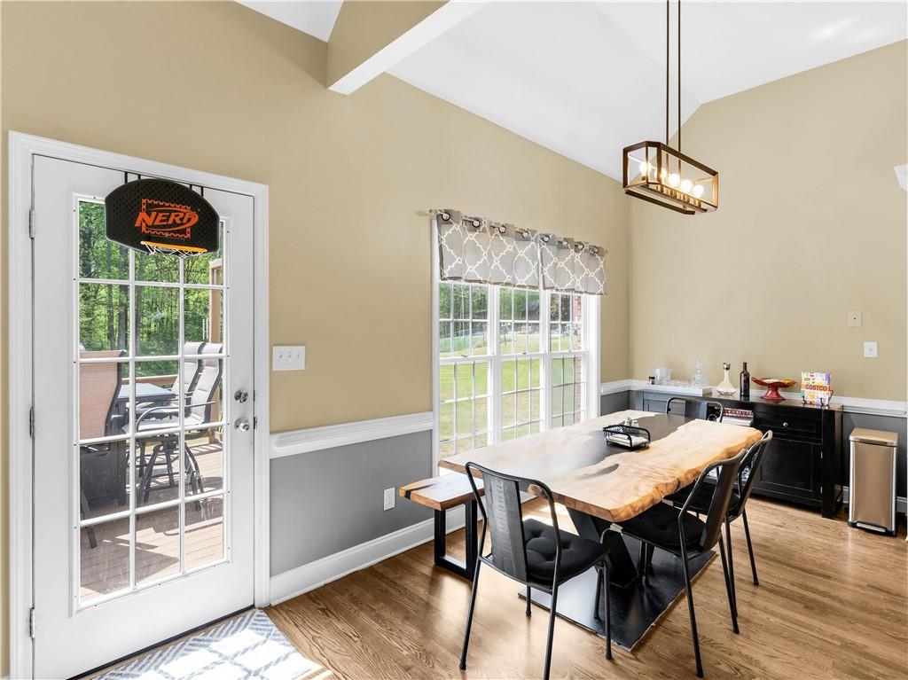 157 Cooks Way McDonough, GA 30252 - Photo 13 of 63 a view of a dining room with furniture window and wooden floor
