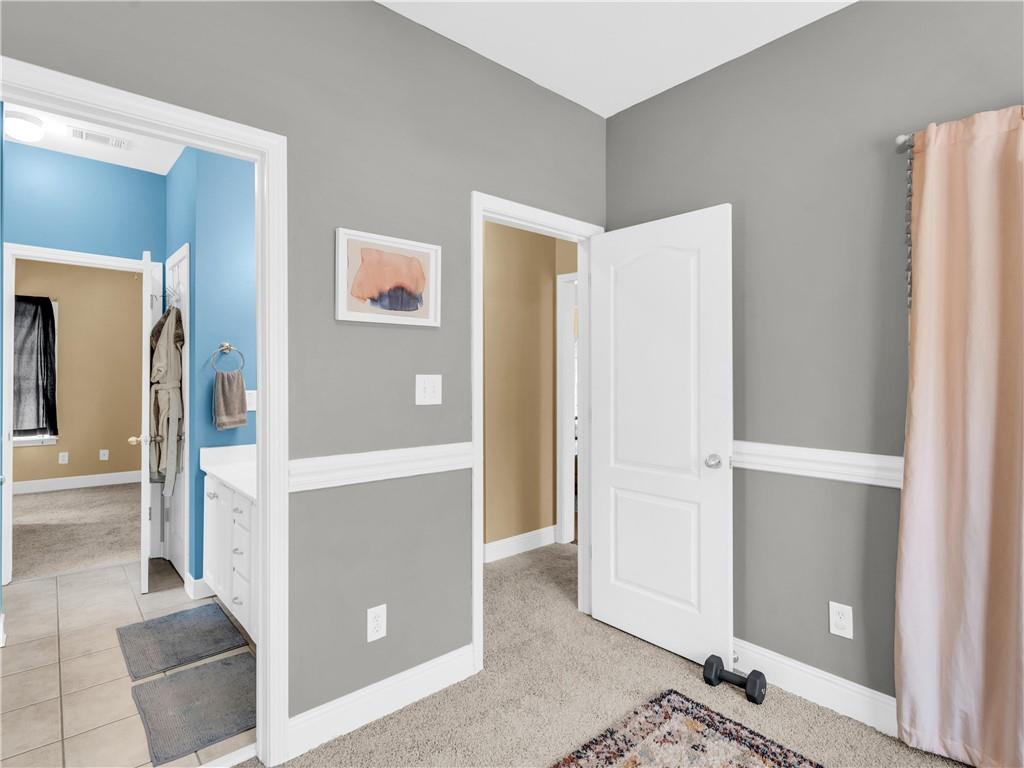157 Cooks Way McDonough, GA 30252 - Photo 30 of 63 a view of a hallway with cabinet and door