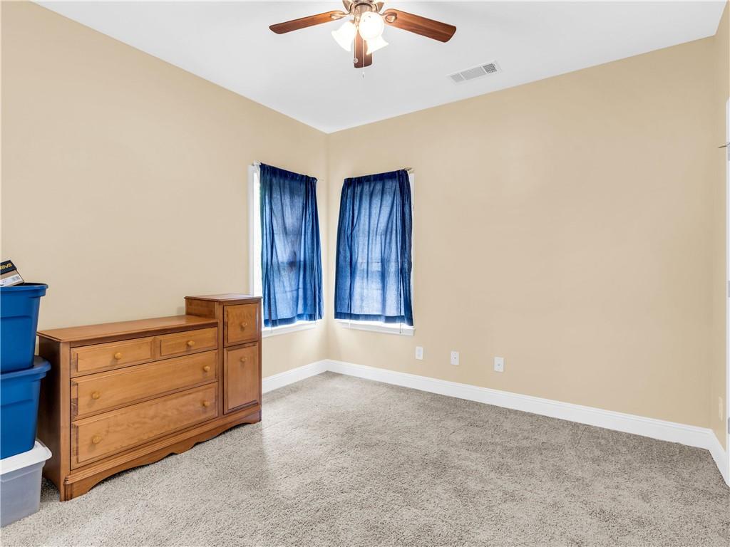157 Cooks Way McDonough, GA 30252 - Photo 35 of 63 a view of an empty room with a cabinet