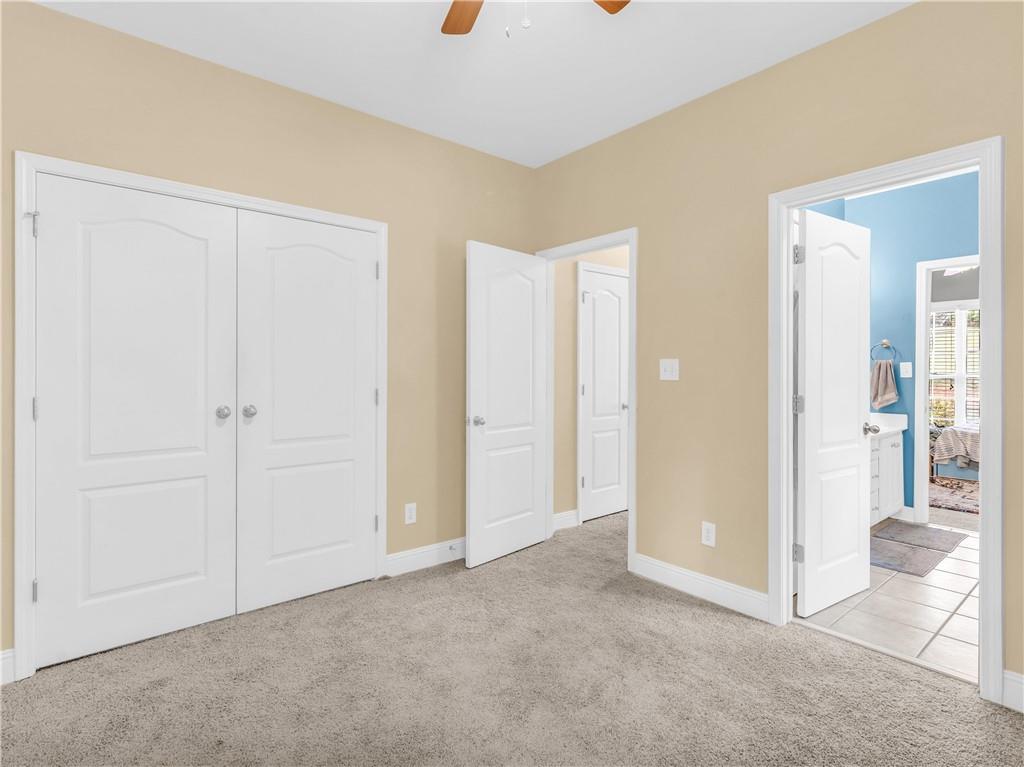 157 Cooks Way McDonough, GA 30252 - Photo 37 of 63 a view of an empty room with glass door