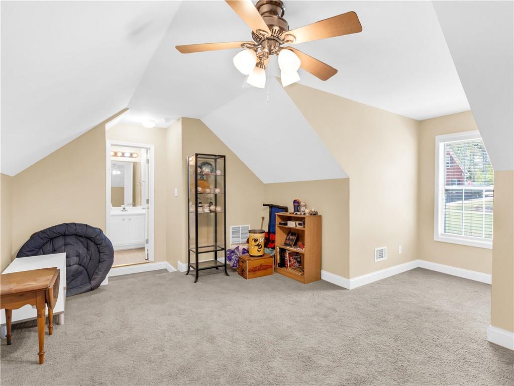 157 Cooks Way McDonough, GA 30252 - Photo 40 of 63 a living room with furniture and a ceiling fan