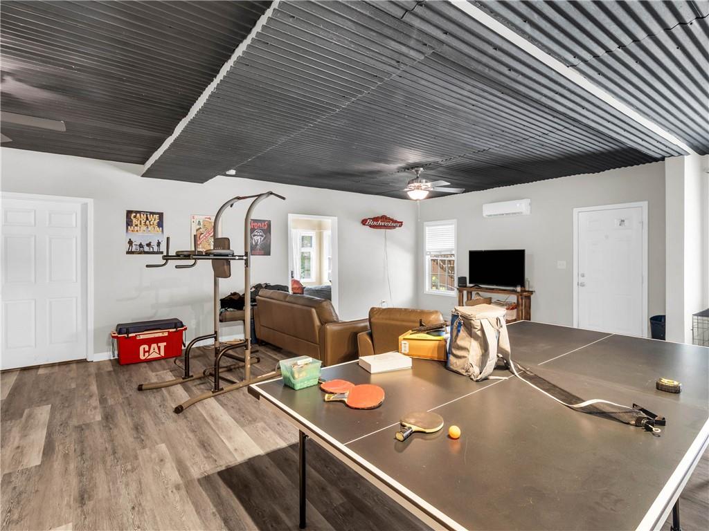 157 Cooks Way McDonough, GA 30252 - Photo 42 of 63 a living room with furniture and a flat screen tv