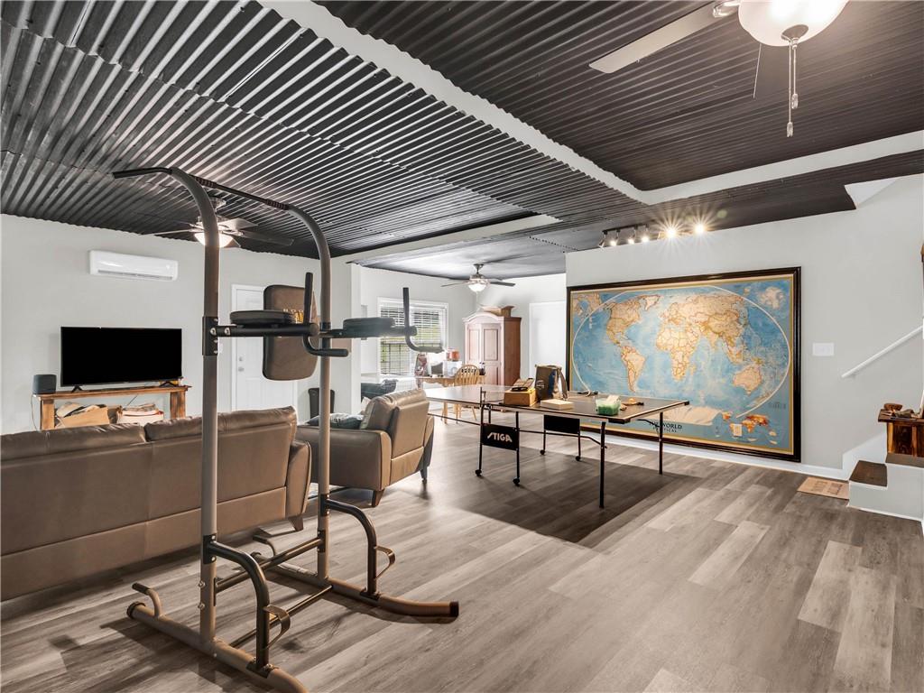 157 Cooks Way McDonough, GA 30252 - Photo 45 of 63 a view of a livingroom with furniture and a flat screen tv