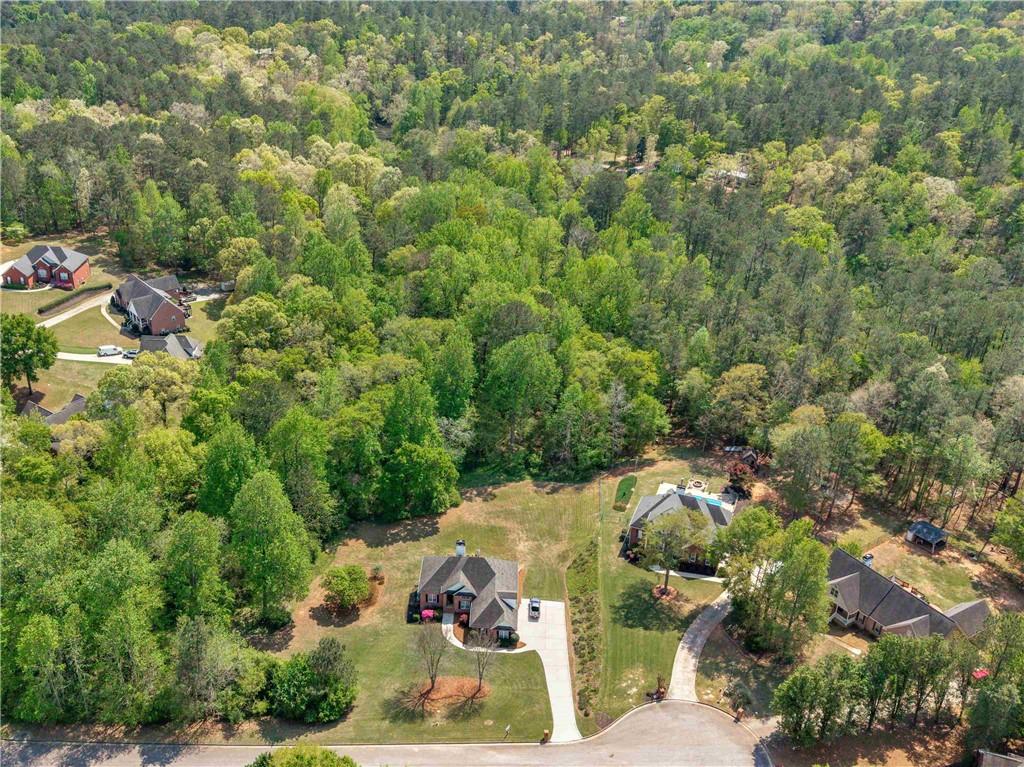 157 Cooks Way McDonough, GA 30252 - Photo 61 of 63 an aerial view of a house with yard swimming pool and outdoor seating