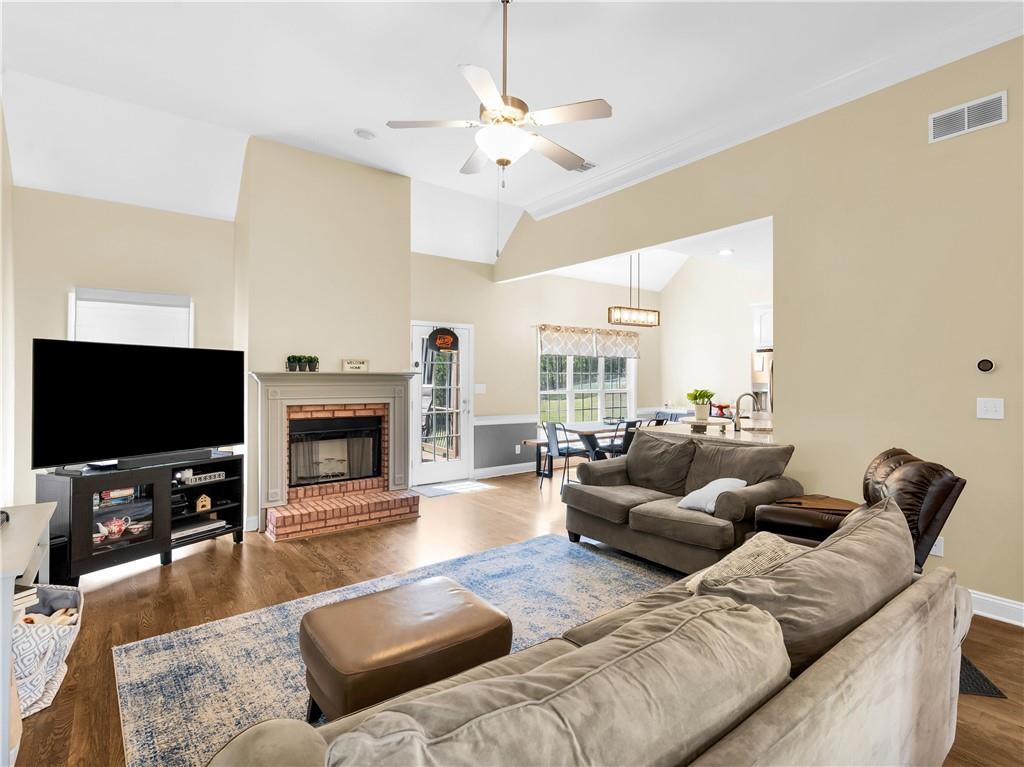 157 Cooks Way McDonough, GA 30252 - Photo 9 of 63 a living room with furniture and a flat screen tv