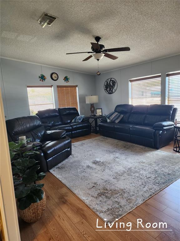 1001 Starkey Road, Unit 758 Largo, FL 33771 - Photo 2 of 20 a living room with furniture and a rug