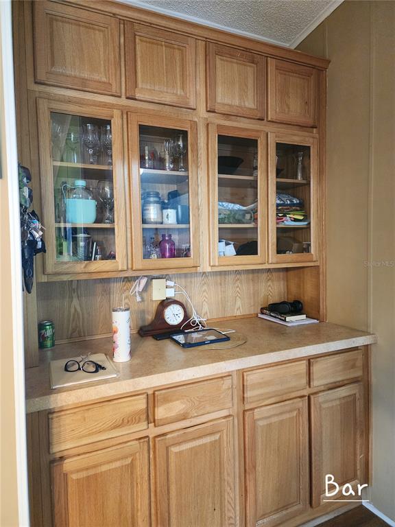 1001 Starkey Road, Unit 758 Largo, FL 33771 - Photo 6 of 20 a kitchen with stainless steel appliances granite countertop a sink and a cabinets
