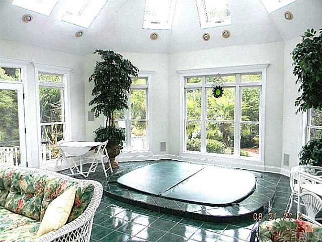 5205 Deergrass Court Raleigh, NC 27613 - Photo 7 of 25 Ready to relax? How about doing that in your hot tub? Sun Room