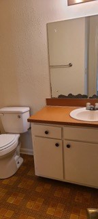 4139 Curry Street Columbus, GA 31907 - Photo 13 of 18 a bathroom with a toilet and a sink