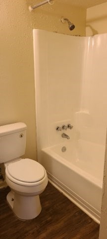 4139 Curry Street Columbus, GA 31907 - Photo 14 of 18 a bathroom with a toilet and a shower