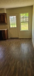 an empty room with windows