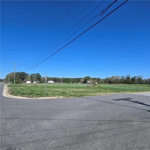 a view of a road with a yard