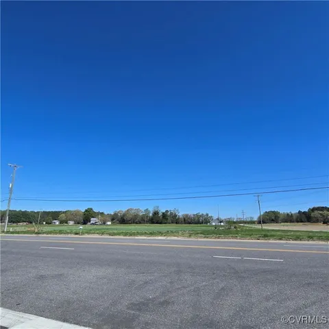 a view of a road with an ocean