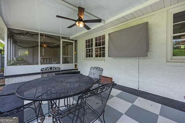 a view of a yard with a tree