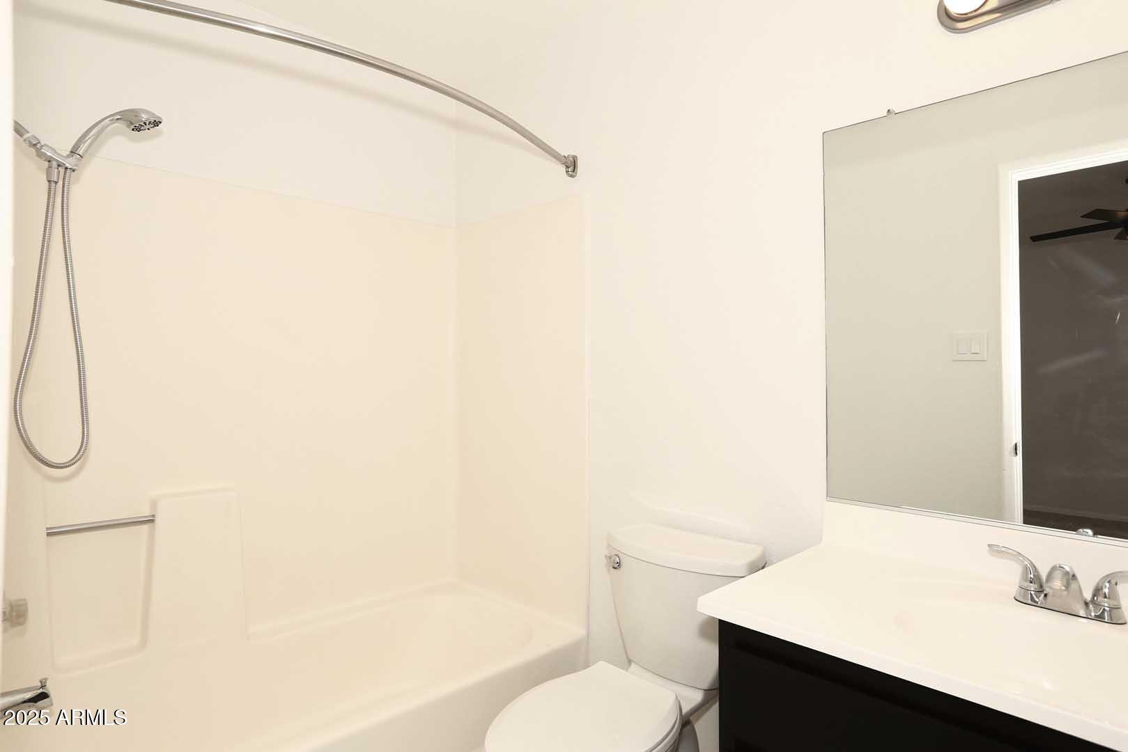 93 North Cooper Road, Unit 32 Chandler, AZ 85225 - Photo 14 of 33 a bathroom with a sink toilet and shower