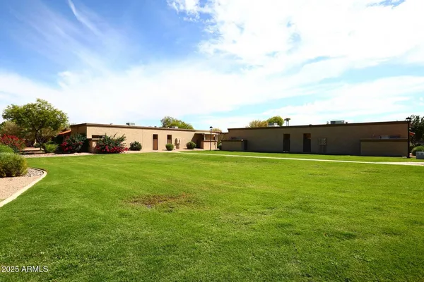 a view of a garden with a pole