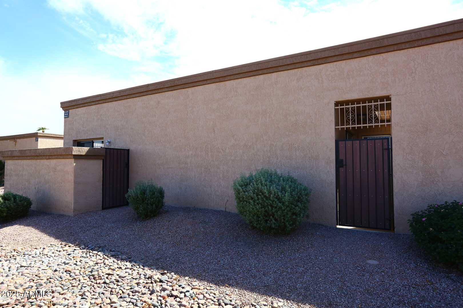 93 North Cooper Road, Unit 32 Chandler, AZ 85225 - Photo 10 of 33 a view of a backyard