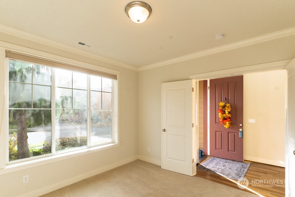 3825 221st Place Southeast Bothell, WA 98021 - Photo 15 of 40 an empty room with windows