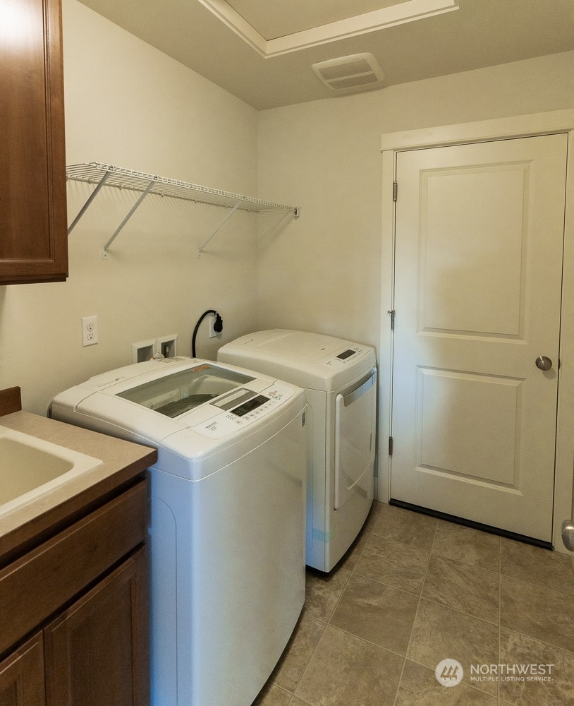 3825 221st Place Southeast Bothell, WA 98021 - Photo 35 of 40 a utility room with dryer and washer