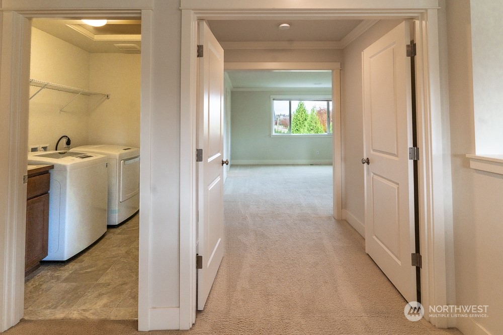 3825 221st Place Southeast Bothell, WA 98021 - Photo 38 of 40 a view of a hallway with a white walls