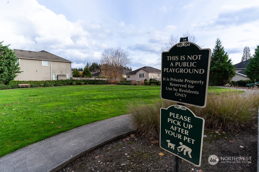 3825 221st Place Southeast Bothell, WA 98021 - Photo 7 of 40 a sign on the side of the river