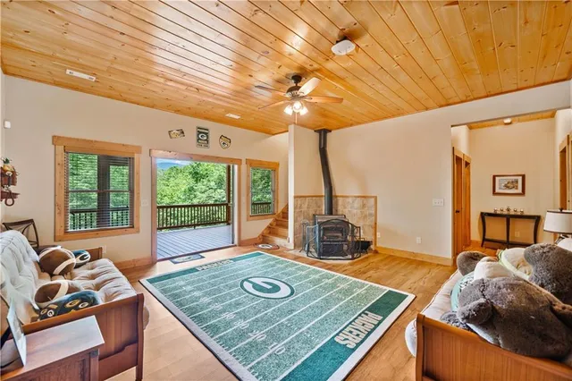 a view of a room with furniture and window