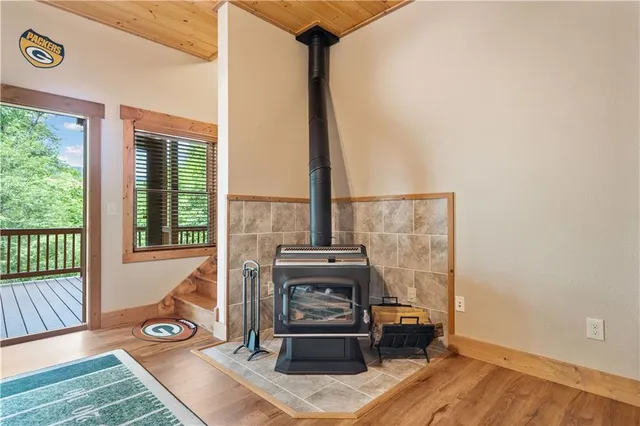 a view of a workspace with wooden floor
