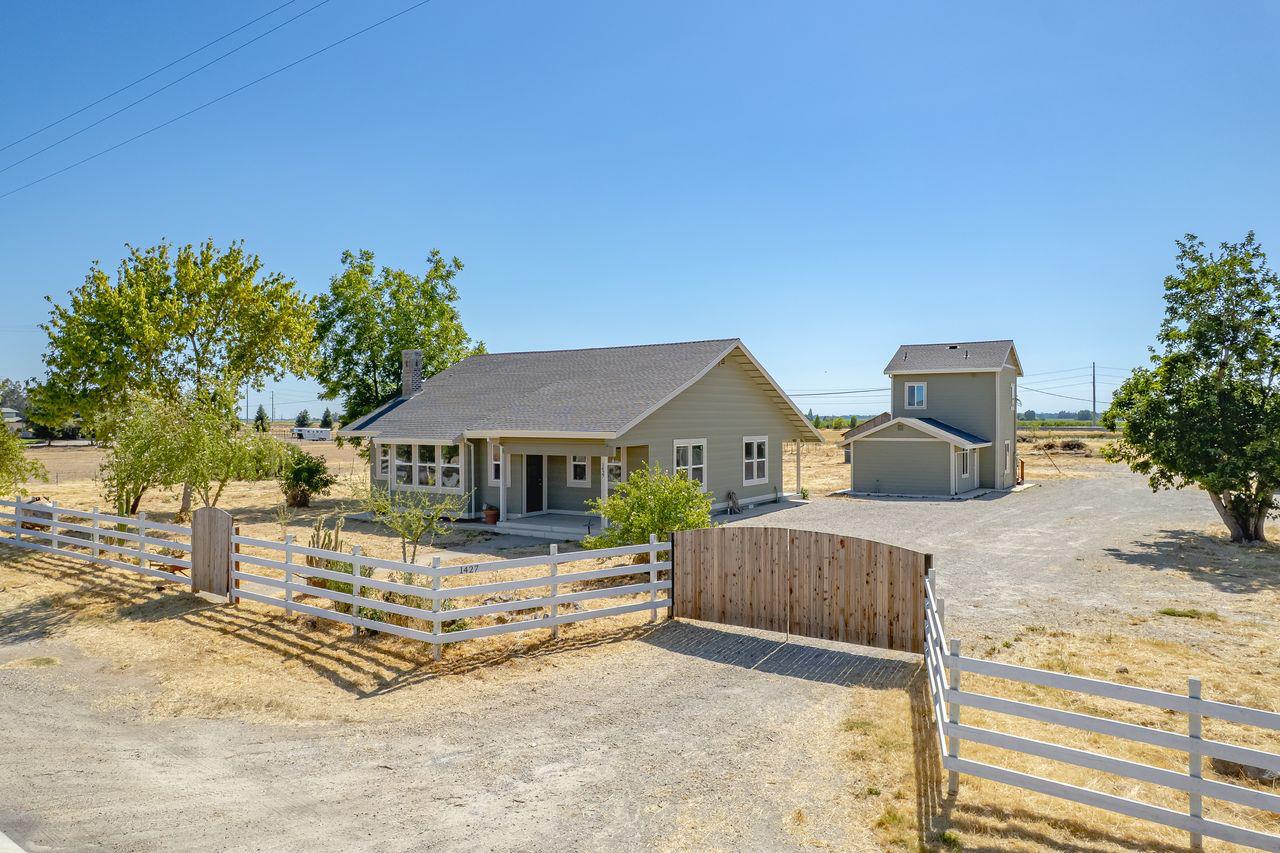 a front view of a house with a patio