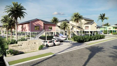 a front view of a house with a garden and patio