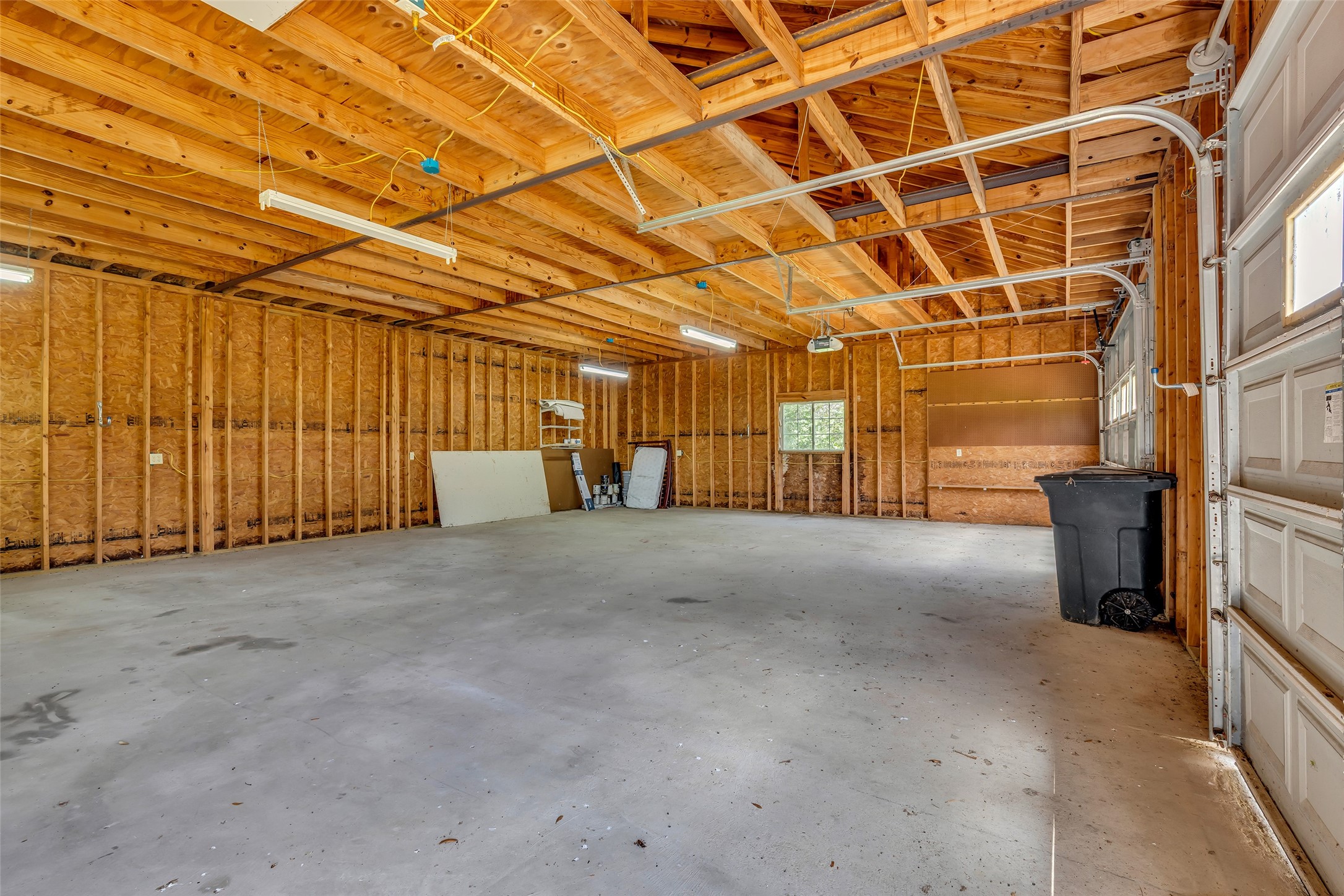 1075 Harrisburg Road Brenham, TX 77833 - Photo 40 of 48 Impressive 3-car garage for storing your vehicles or workshop needs