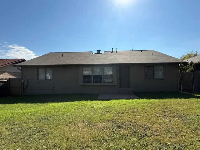 a front view of a house having yard