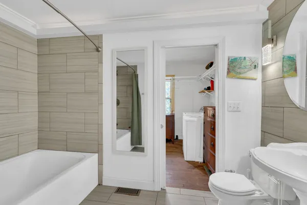 a bathroom with a sink and bathtub